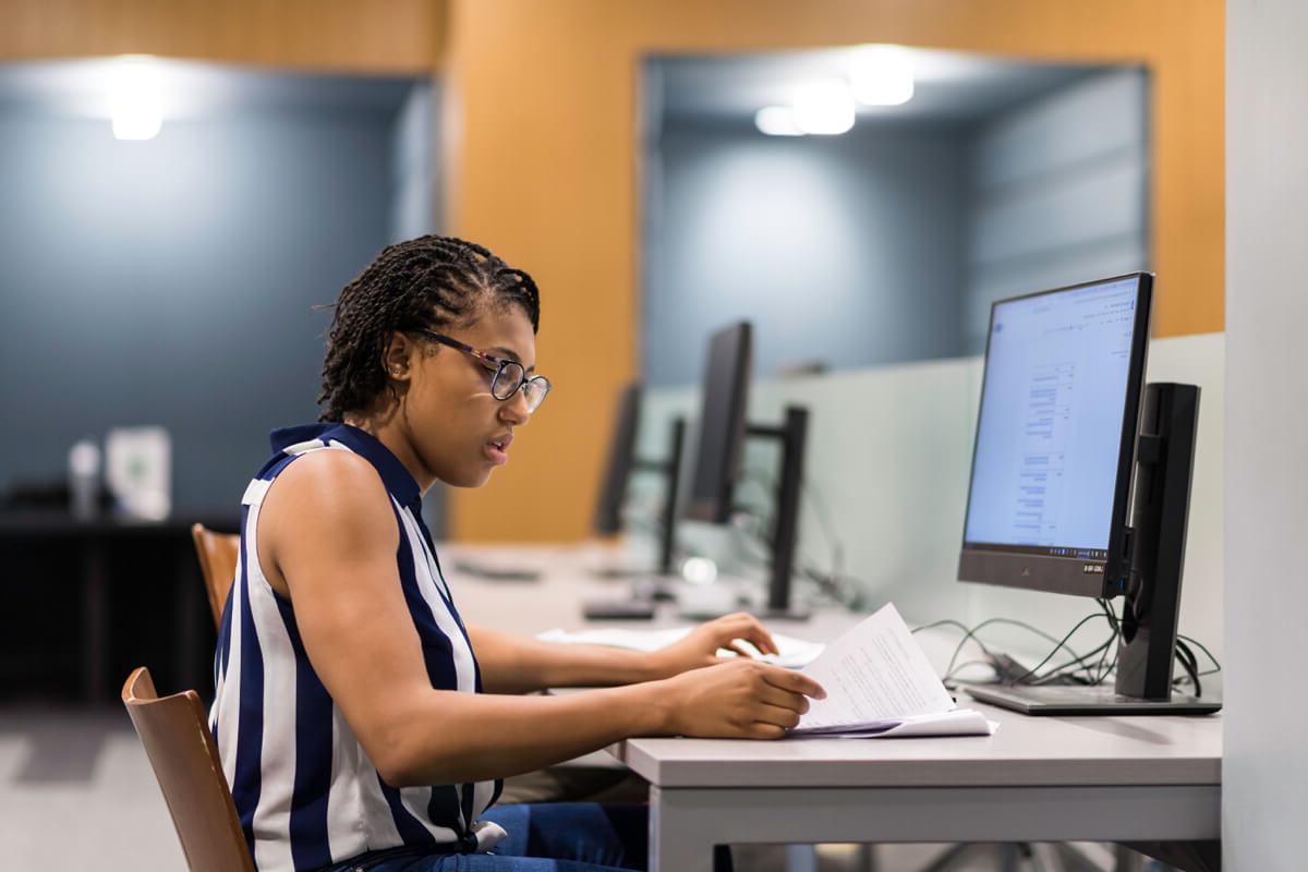 Student works in a computer lab at University of Rochester